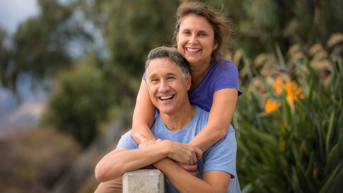 Couple taking an anti-ageing supplement